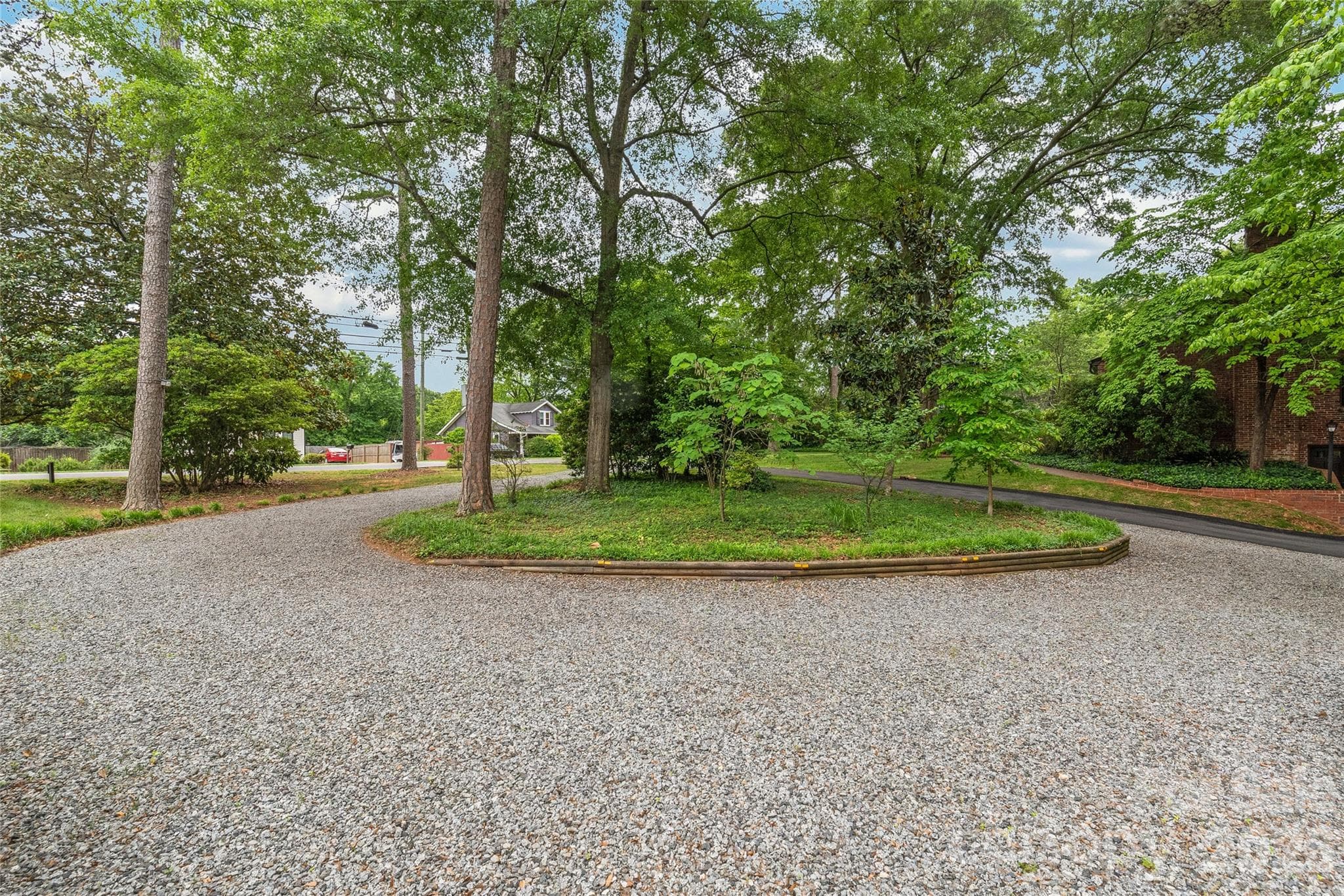 Gravel overflow drive - Great for extra parking and events! - 600 S Central Avenue, Belmont