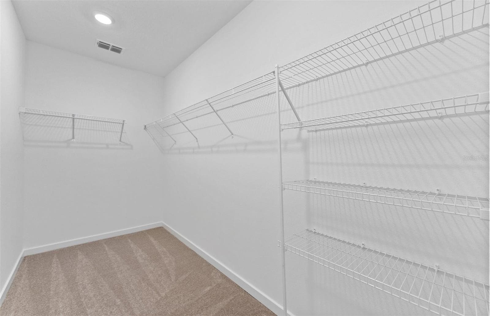 Owner's Walk-in Closet - 3033 WINDSWEPT WAY, WILDWOOD