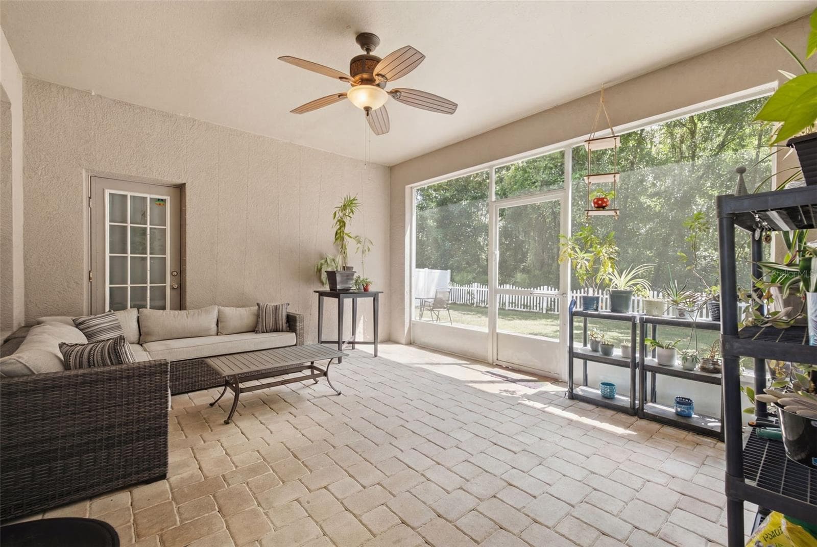 Large screened lanai overlooking fenced yard and conservation - 6846 PINE SPRINGS, WESLEY CHAPEL
