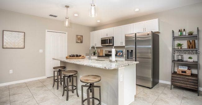 Model home - actual features may vary. - 1475 TRINIDAD ST, DELAND