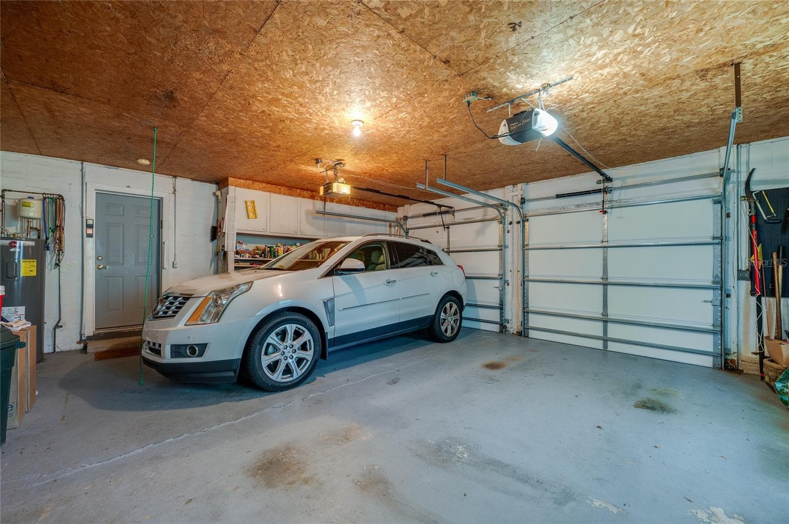 2-car garage - 697 JOHN ANDERSON DR, ORMOND BEACH