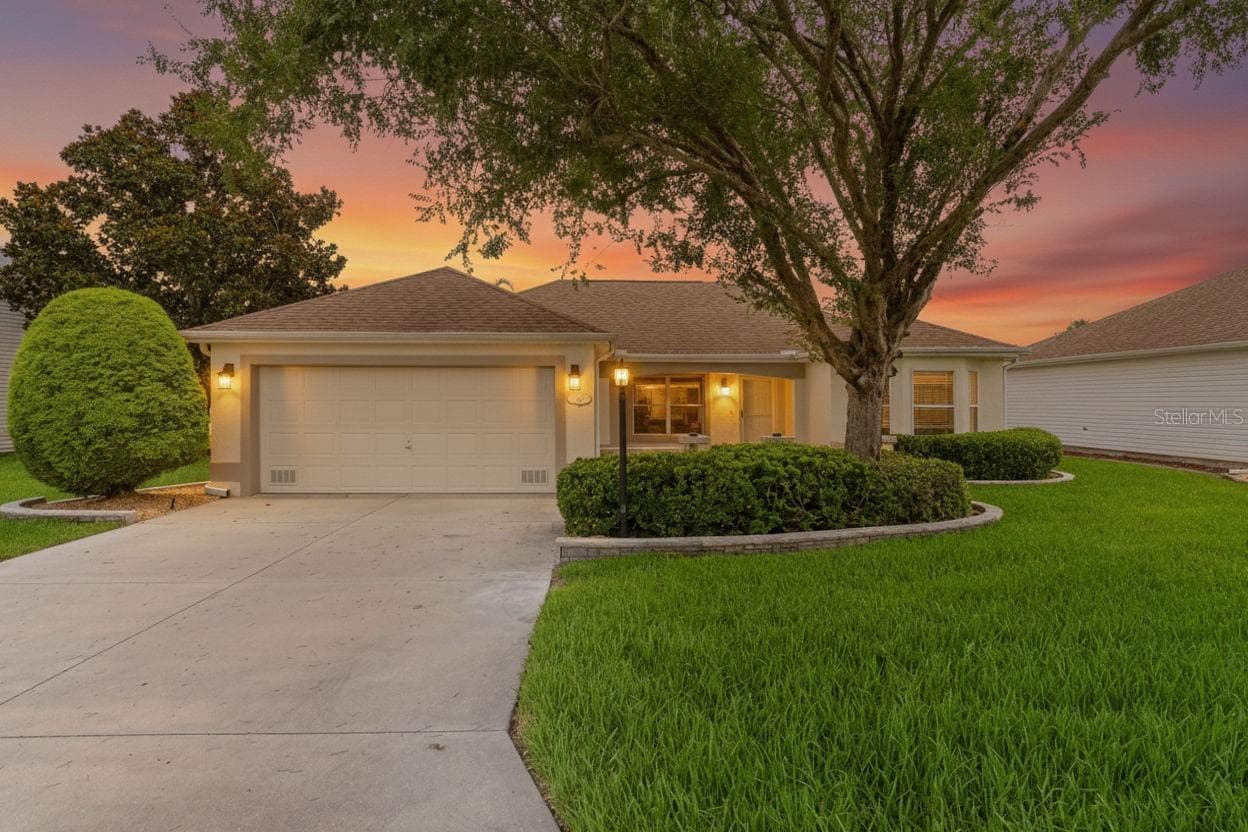 Front at dusk - 1213 EL ESPARZA LN, THE VILLAGES