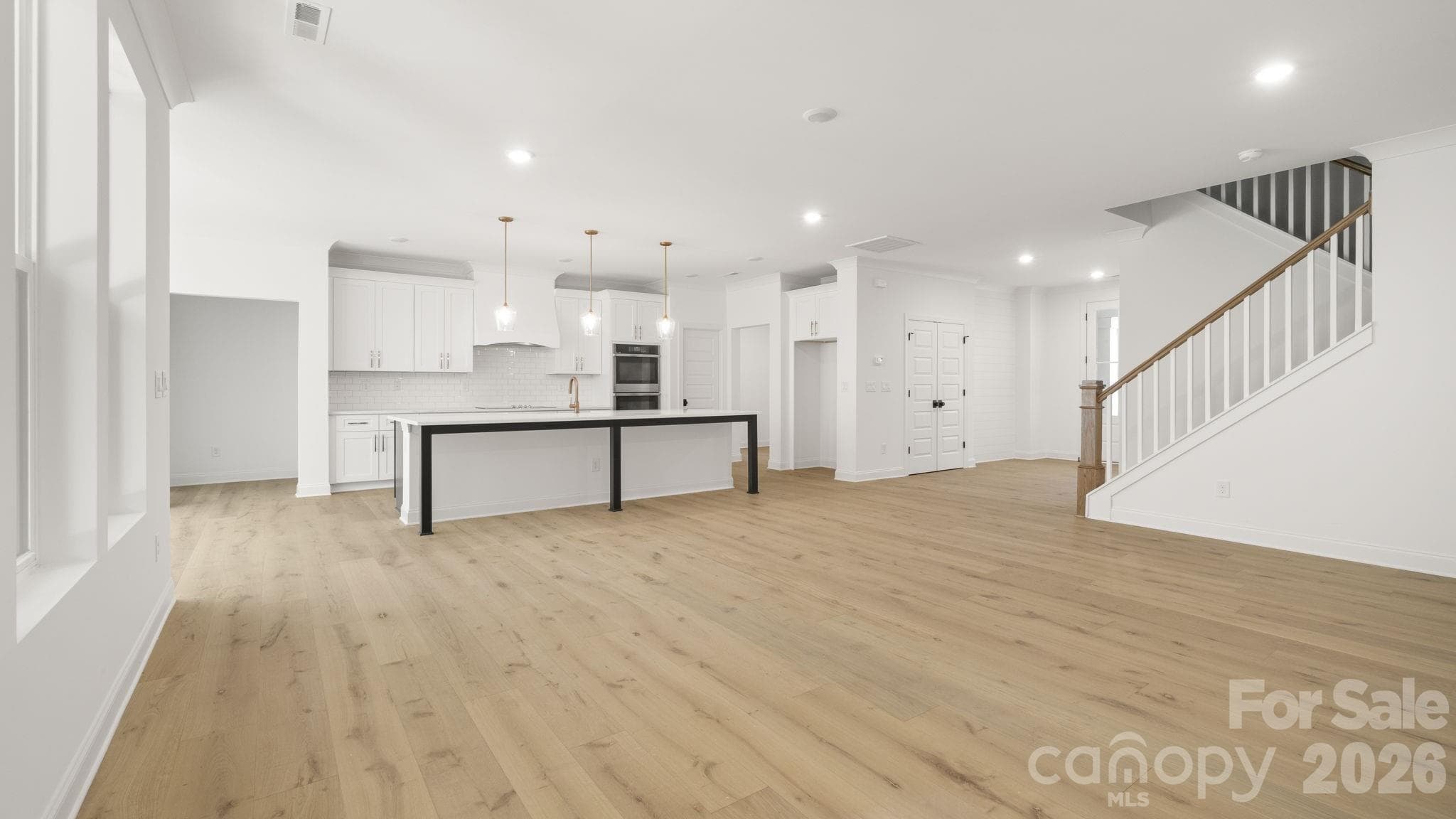 Living to Kitchen - 6774 Kingfisher Court, Denver