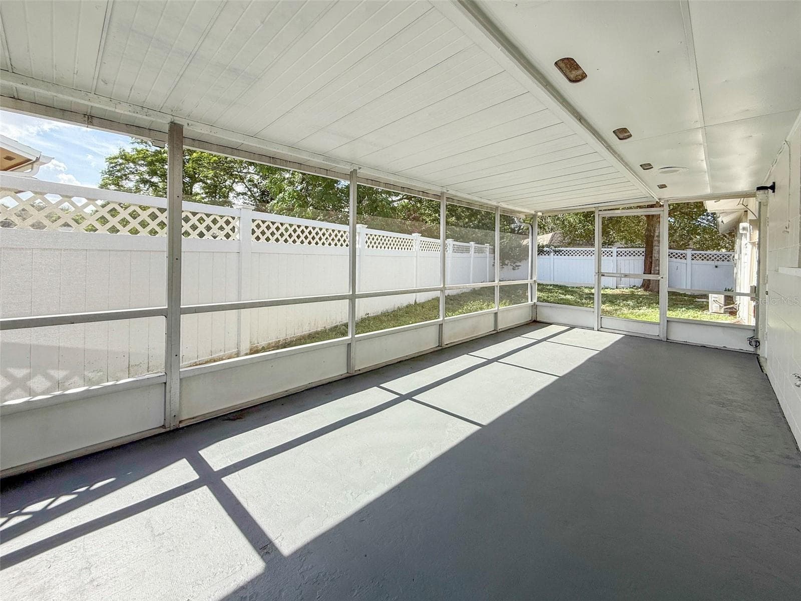 Enclosed rear patio - 142 BAYBERRY CT, WINTER SPRINGS