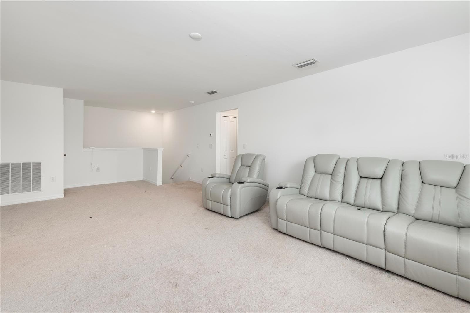 Expansive upstairs loft perfect for a media room, game room, fitness space, or second living area. - 17177 MONTE ISOLA WAY, NORTH FORT MYERS
