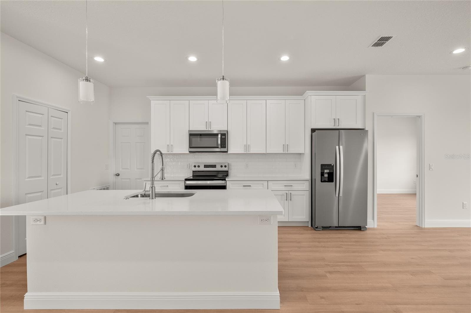 Single Family Residence at 132 11TH AVE, OSTEEN, photo 11 of 39