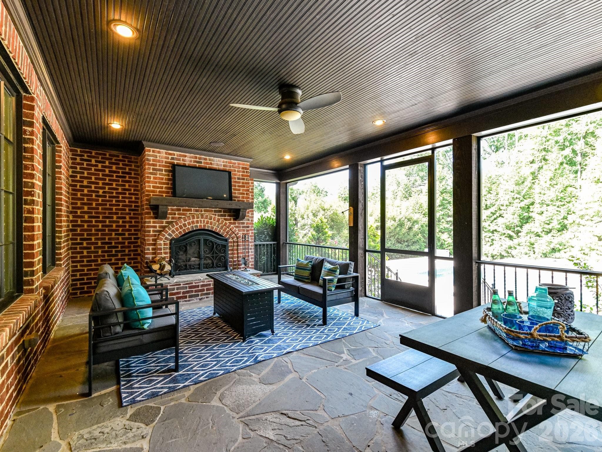 Screened in back porch with fireplace - 808 Huntington Park Drive, Charlotte