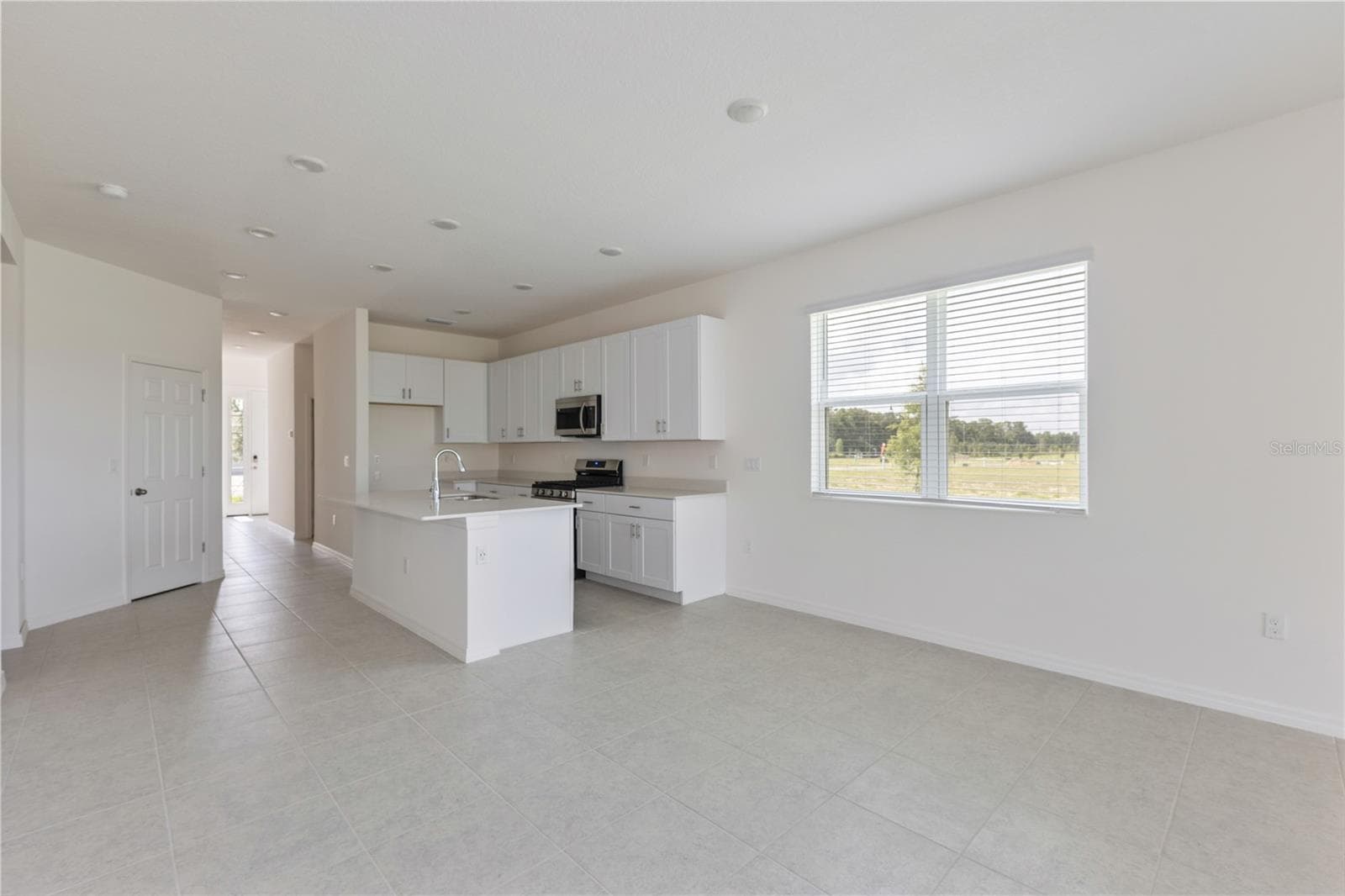 Single Family Residence at 9128 WILDLIGHT TRL, WILDWOOD, photo 4 of 19