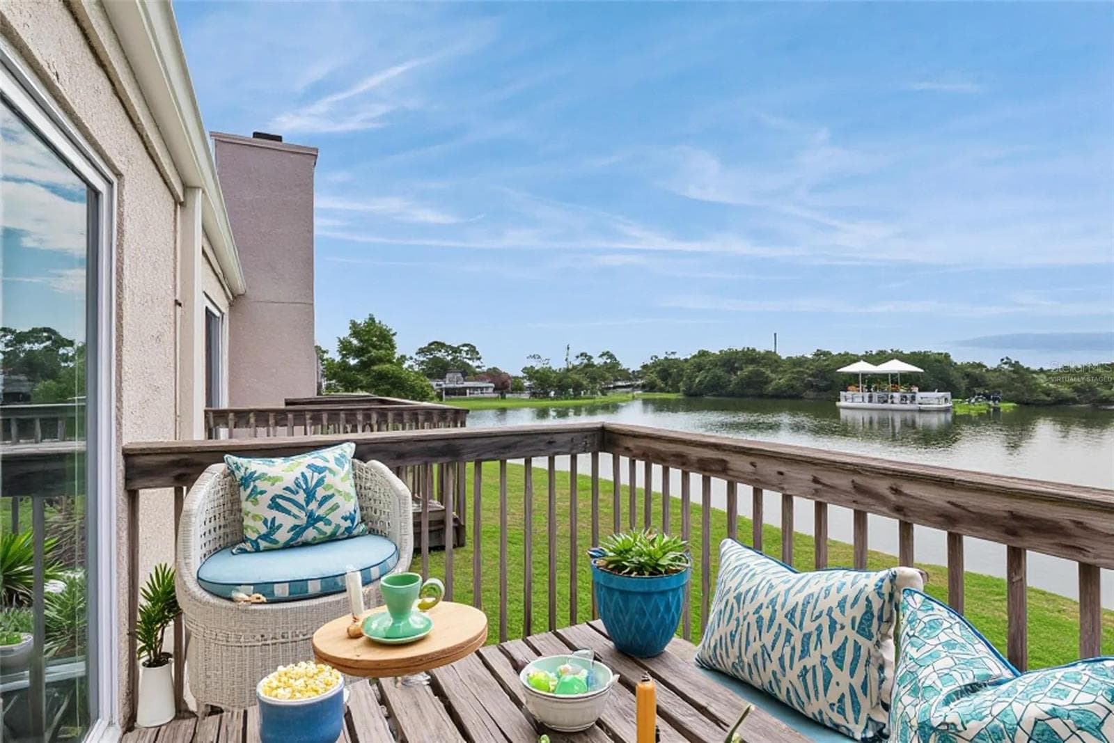 Second Floor Patio with view to the pond - Virtually Staged - 214 MAJORS LN #C, KISSIMMEE