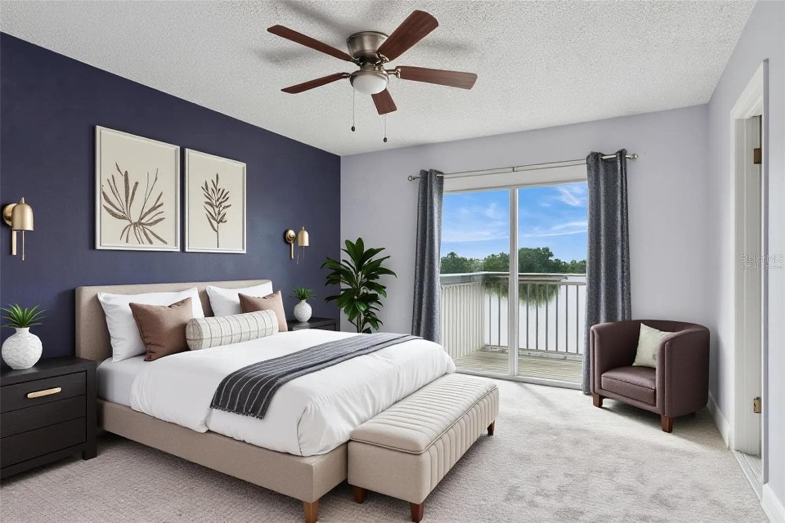 Primary Bedroom with view to the Balcony that overlooks the pond - Virtually Staged - 214 MAJORS LN #C, KISSIMMEE