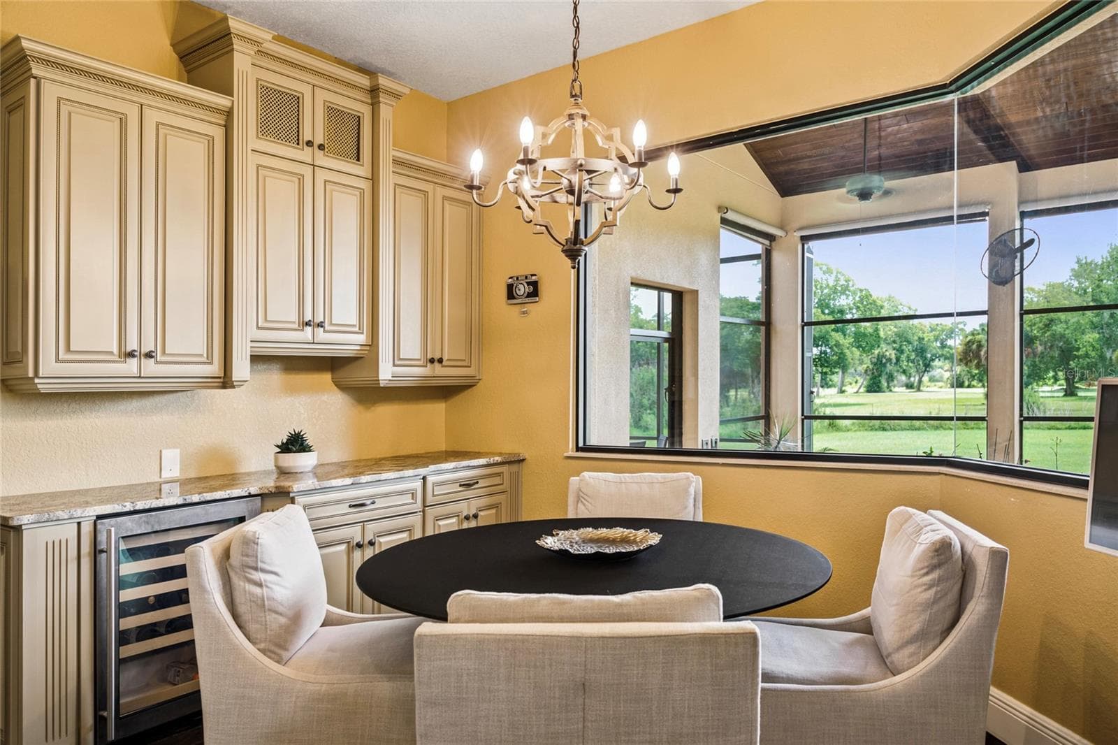 eat in kitchen coffee bar with beverage fridge - 2179 ARNOLD PALMER DR, TITUSVILLE