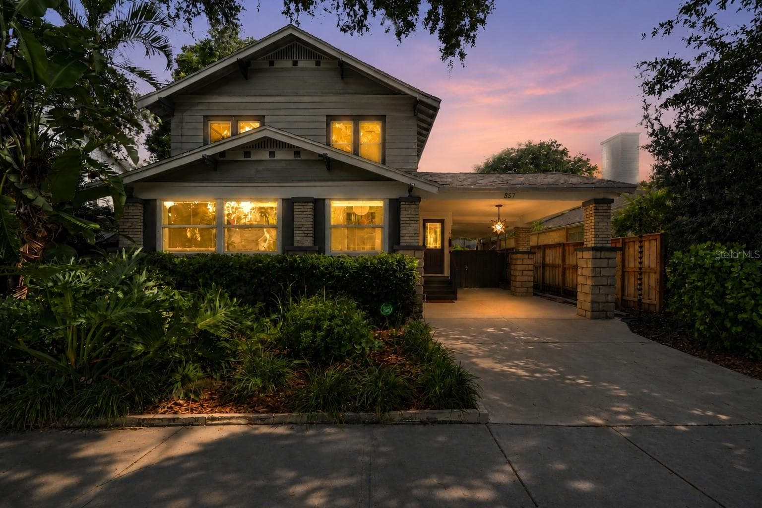Classic Craftsman architecture, lush landscaping, and rare off-street parking create a warm welcome from the moment you arrive. - 857 21ST AVE N, ST PETERSBURG