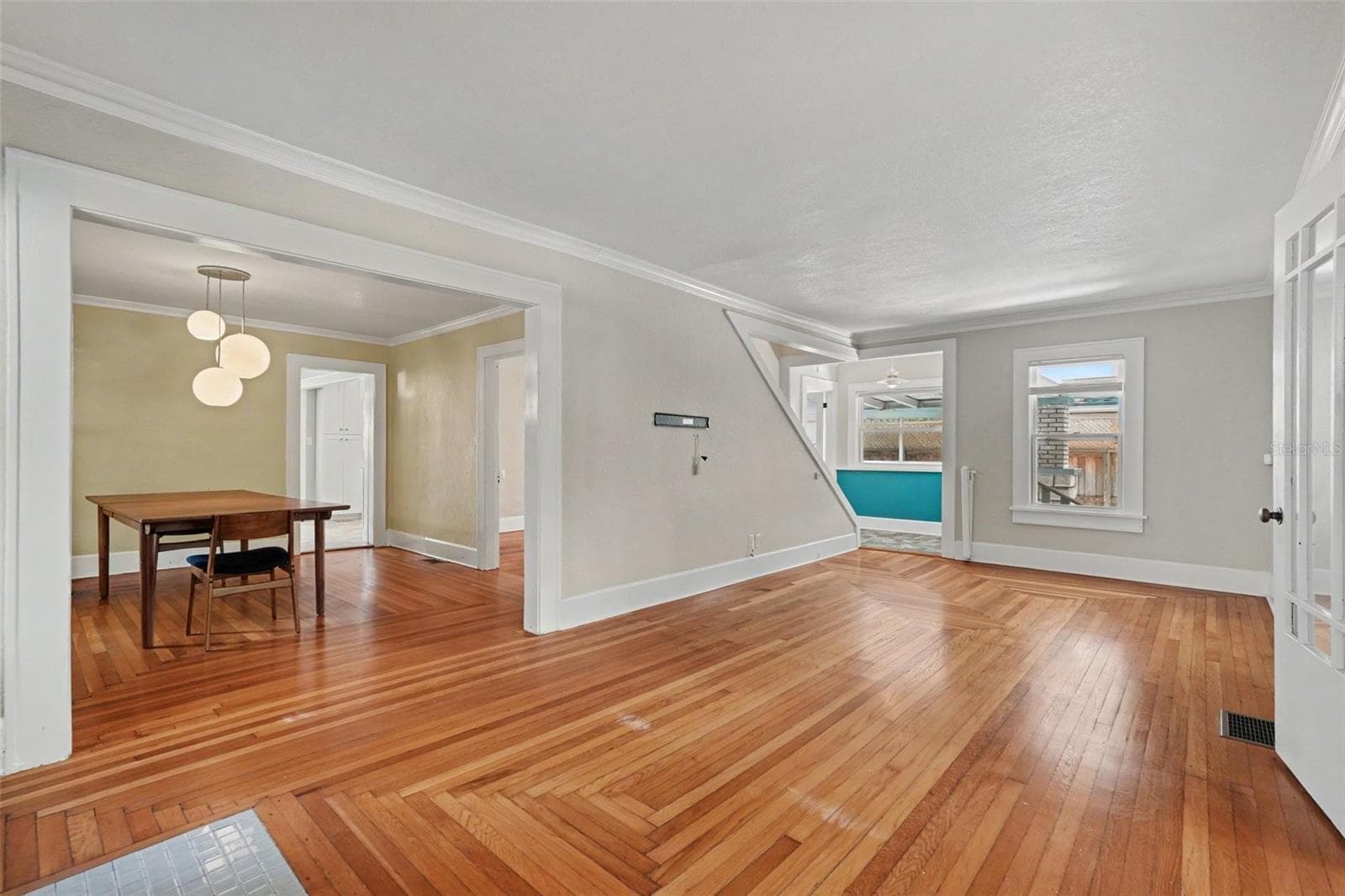 Generous living and dining spaces flow together easily, offering plenty of room for both quiet evenings and gathering with friends. - 857 21ST AVE N, ST PETERSBURG