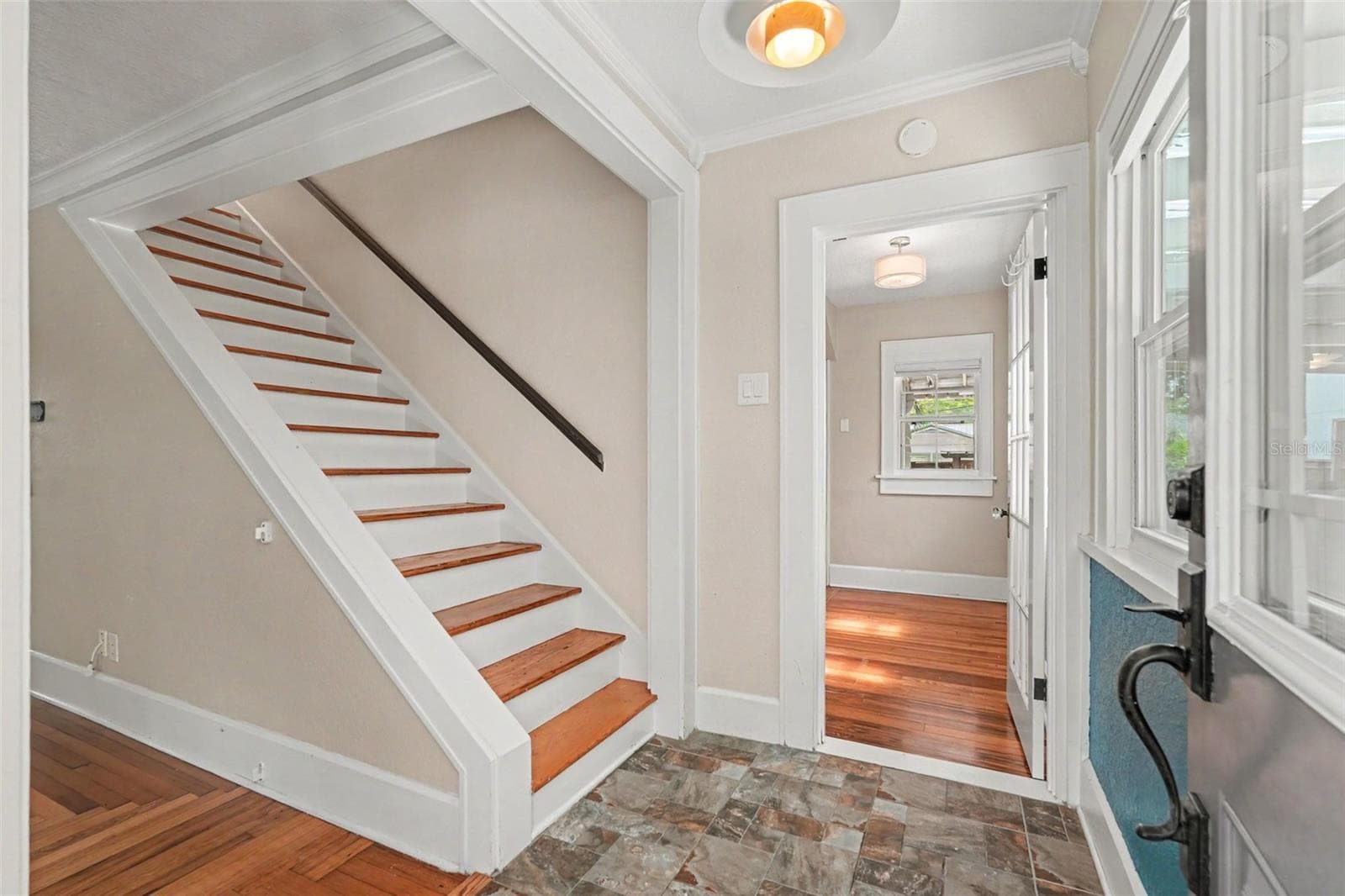 Inside the home you will discover the original details that make this home special, including beautiful heart pine floors and vintage Cuban tile. - 857 21ST AVE N, ST PETERSBURG