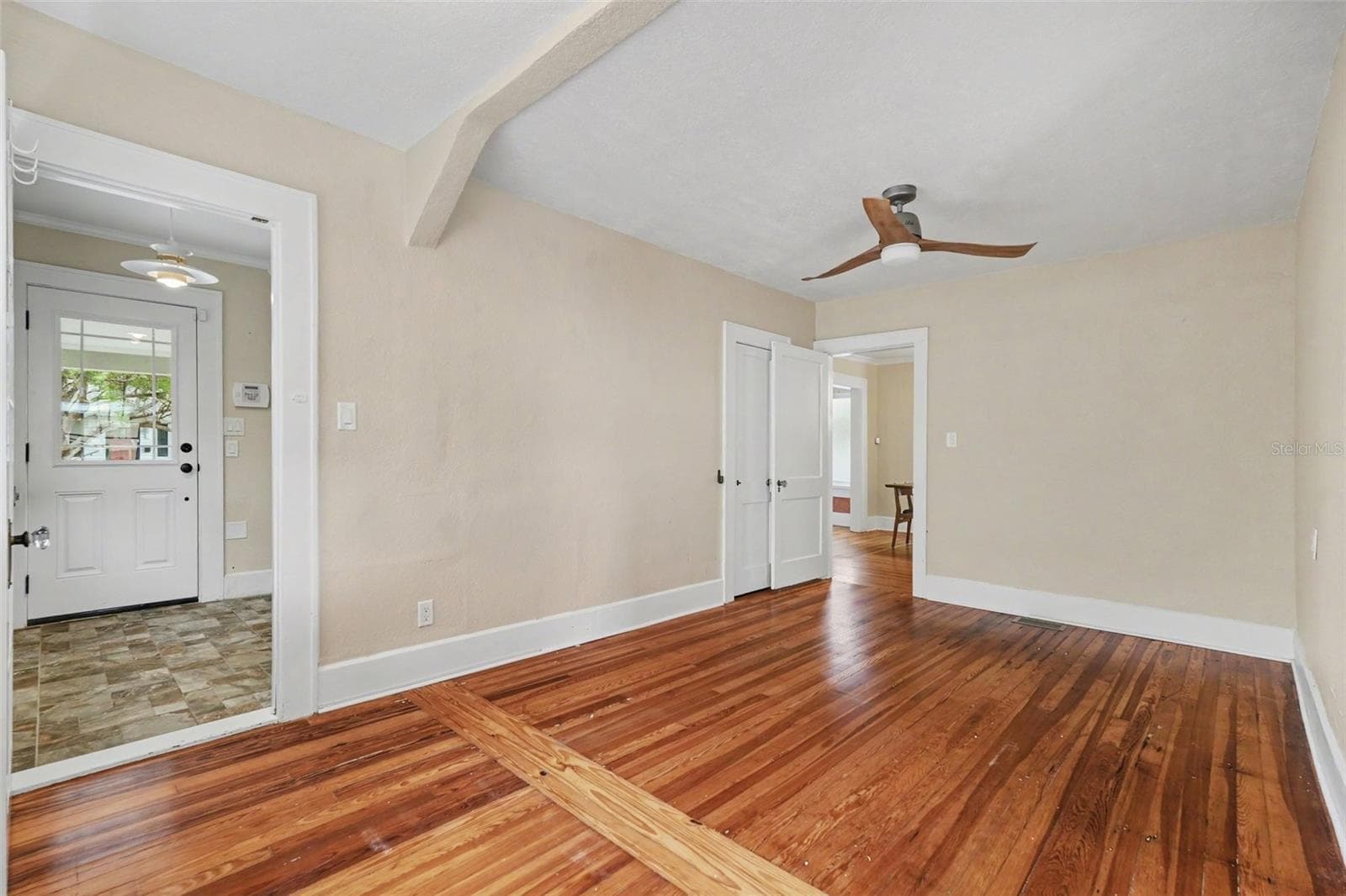 The first-floor room offers valuable flexibility as a guest room, home office, den, or private retreat. - 857 21ST AVE N, ST PETERSBURG