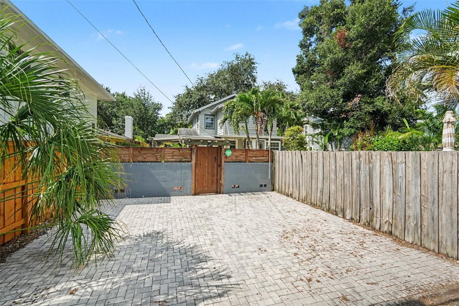 A generous rear parking area provides valuable off-street parking with gated access to the property. - 857 21ST AVE N, ST PETERSBURG