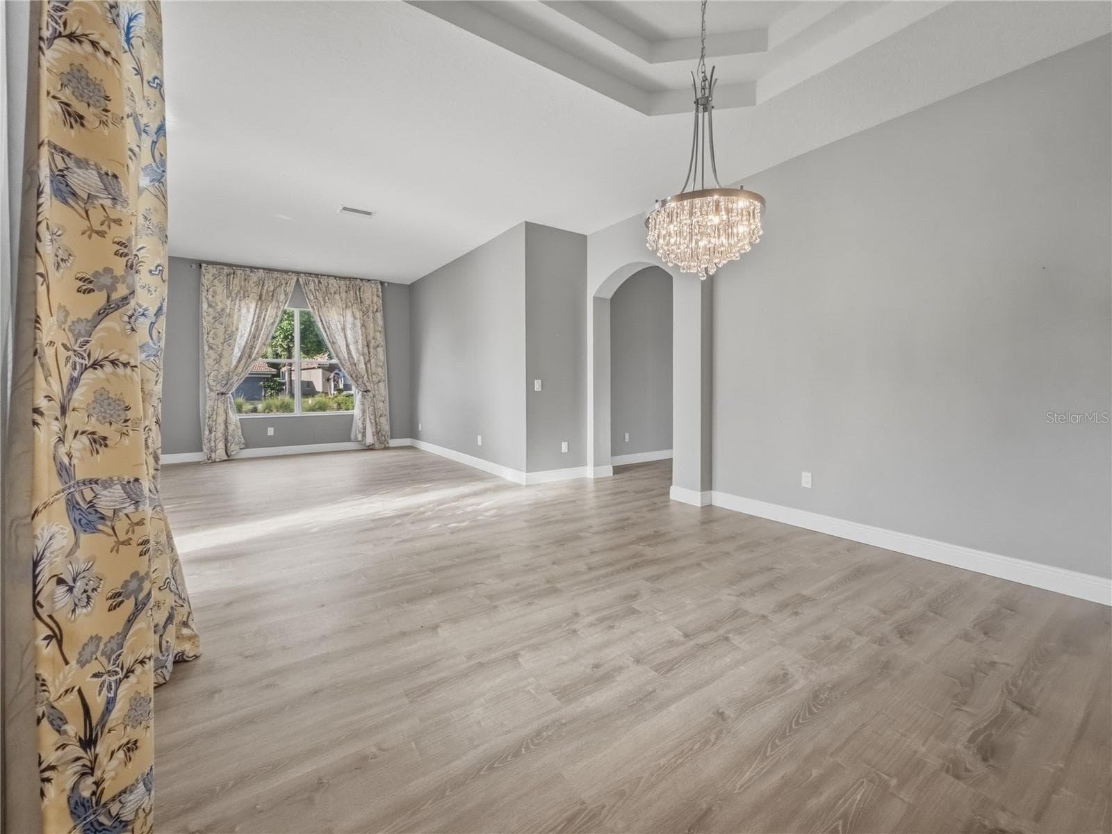 Dining Room + Formal Living Room - 11530 Oyster Bay Circle, New Port Richey, FL 34654 - 11530 OYSTER BAY CIR, NEW PORT RICHEY