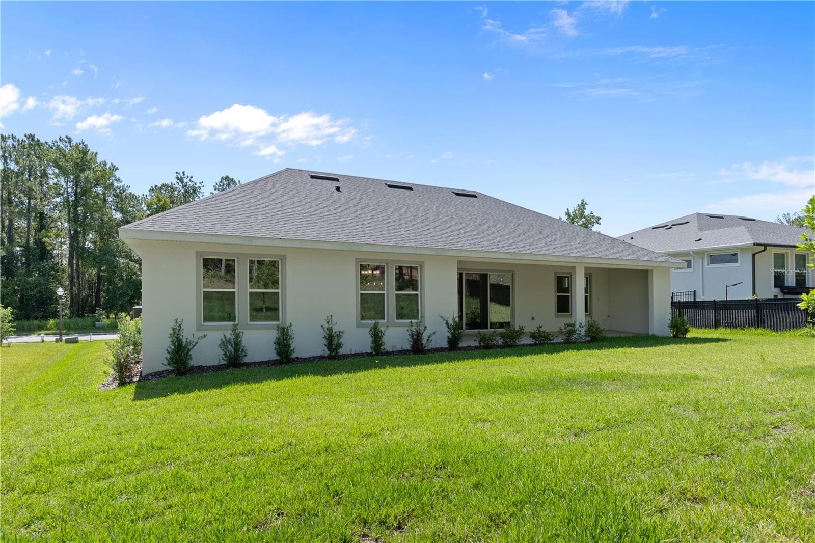 Back of home - 3926 SOUTHERN VALLEY LOOP, BROOKSVILLE
