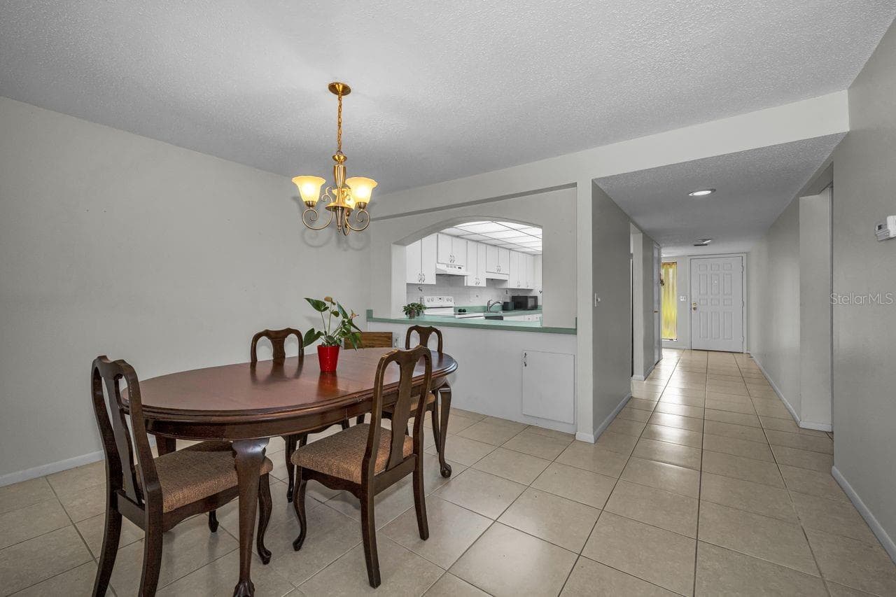 dining room - 3505 TARPON WOODS BLVD #O-403, PALM HARBOR