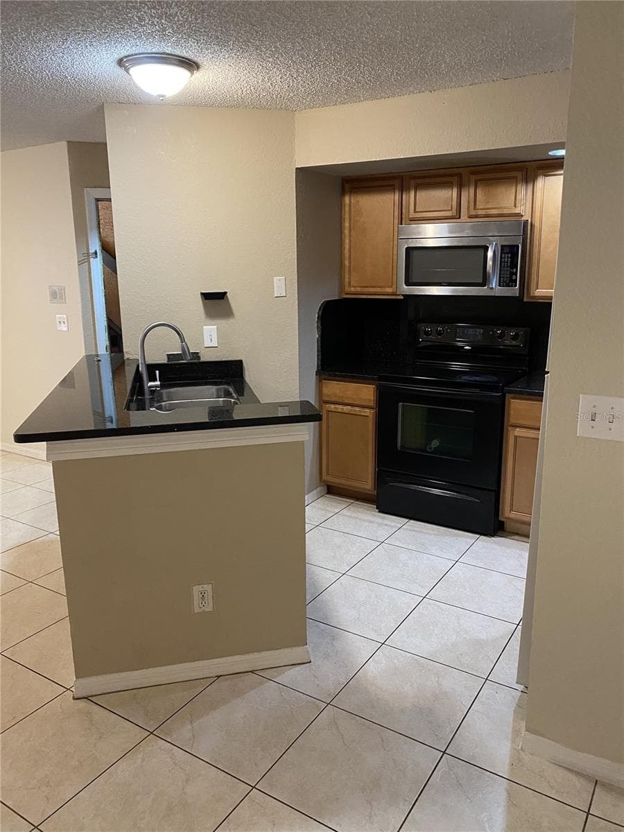 Condominium at 4524 COMMANDER DR #1615, ORLANDO, photo 4 of 14