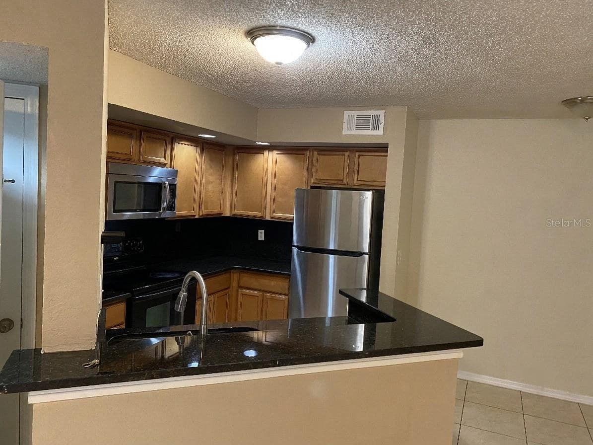 Condominium at 4524 COMMANDER DR #1615, ORLANDO, photo 5 of 14