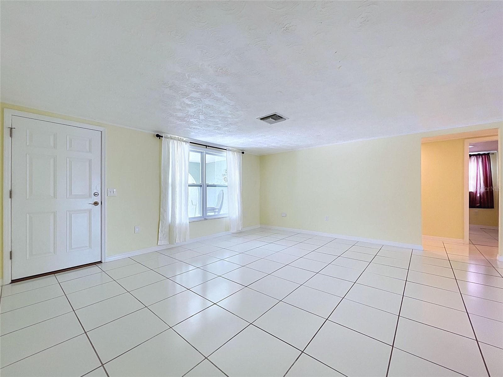 Front living room-not staged - 7401 ISLANDER LN, HUDSON