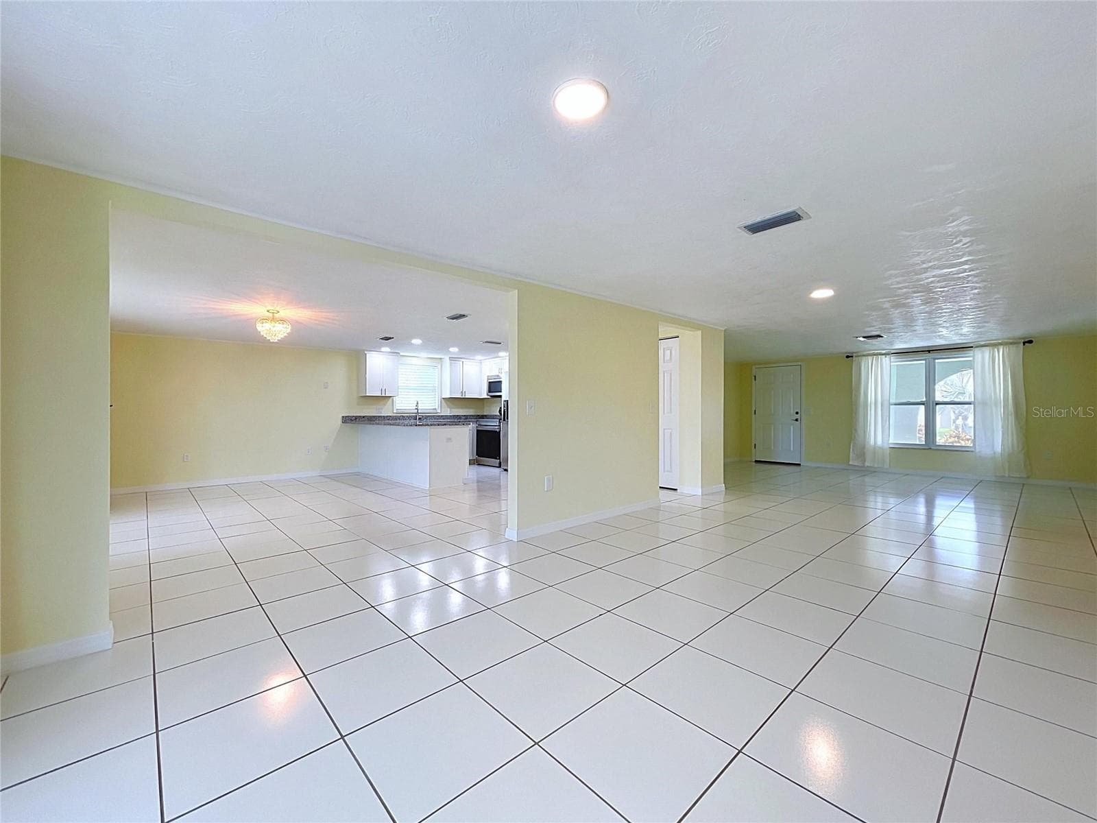 Dining room/kitchen-not staged - 7401 ISLANDER LN, HUDSON