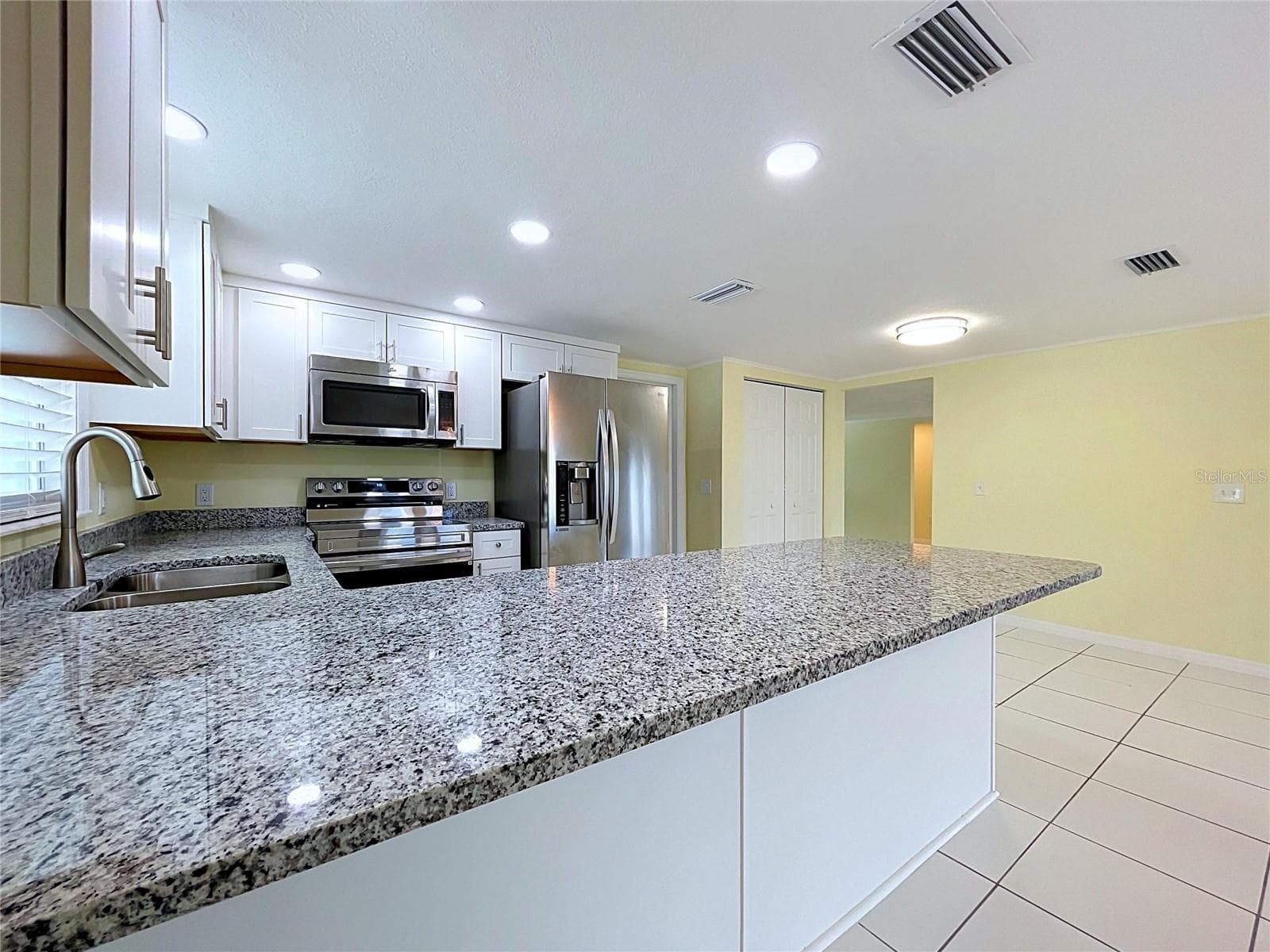 Granite counters! - 7401 ISLANDER LN, HUDSON