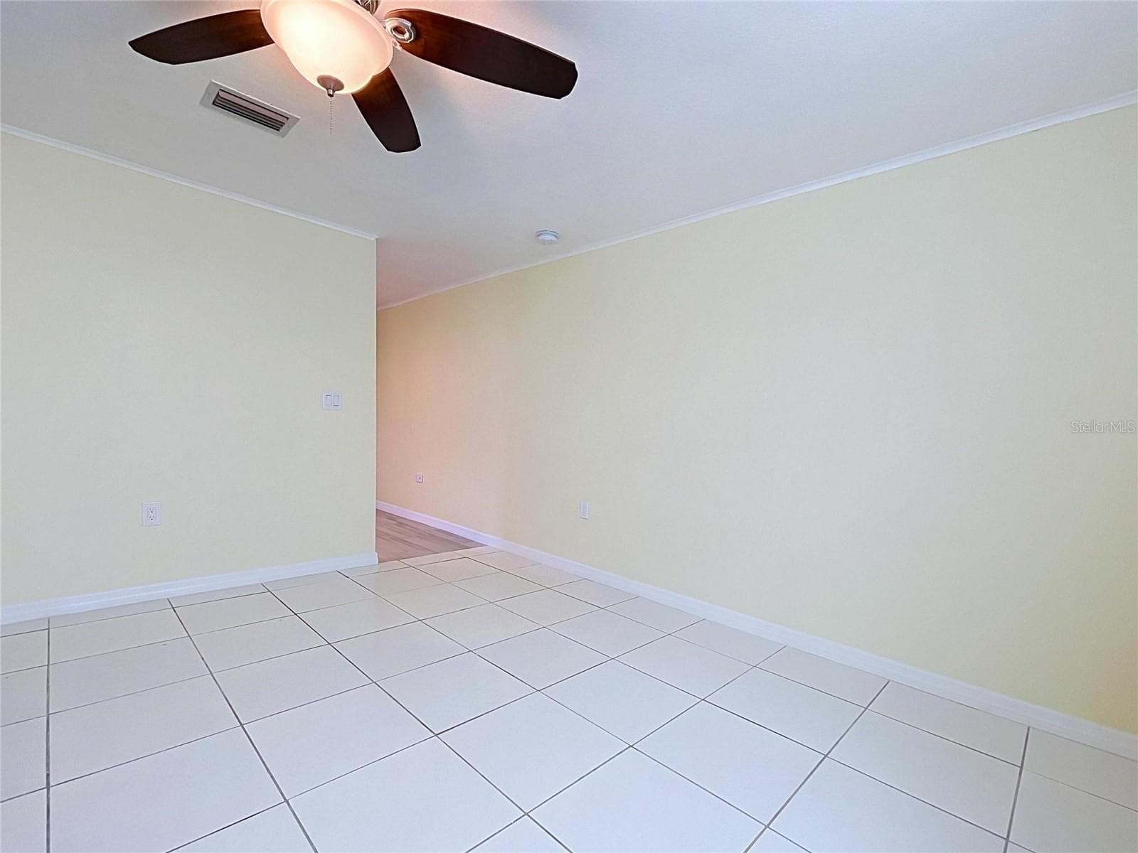 Primary bedroom leading to en suite bathroom - 7401 ISLANDER LN, HUDSON