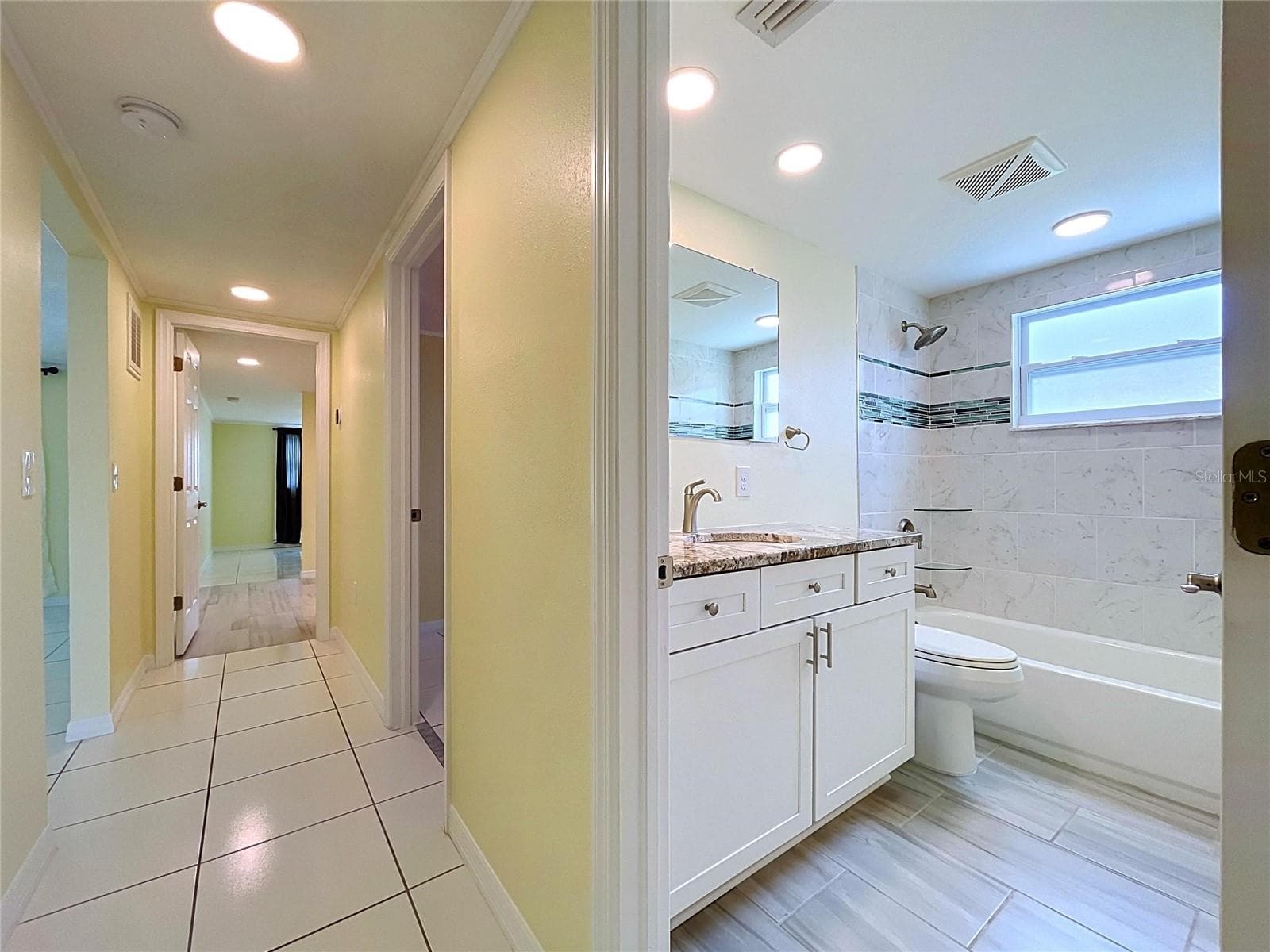 Hallway/Main bathroom - 7401 ISLANDER LN, HUDSON