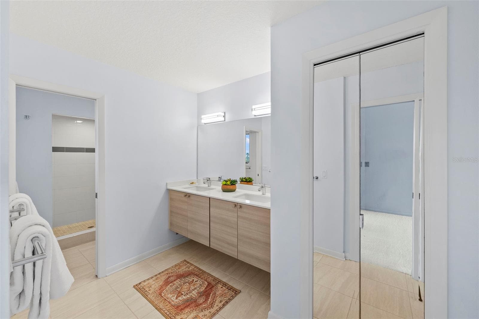 Primary Bath with Double Vanity and Linen Closet - 1304 PASS A GRILLE WAY, ST PETE BEACH