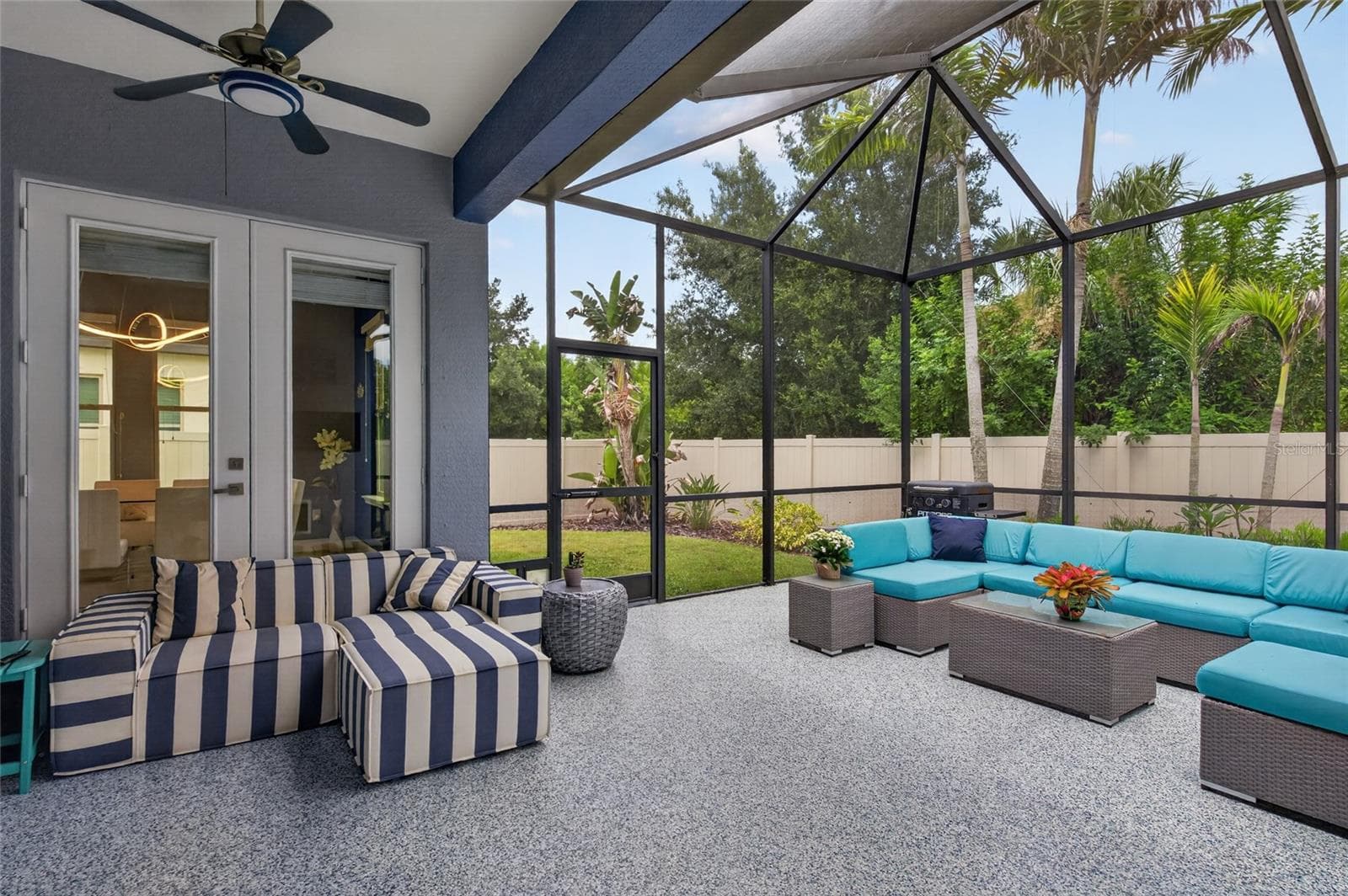 Expansive Lanai with epoxy floor - 735 116TH CT NE, BRADENTON