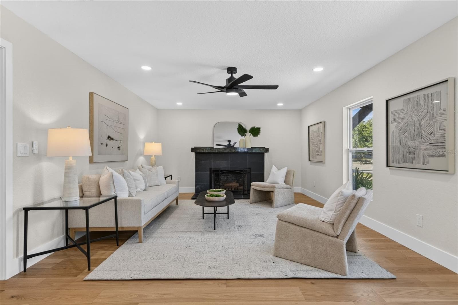 View of the living room with the fireplace - 310 PARK ST N, ST PETERSBURG