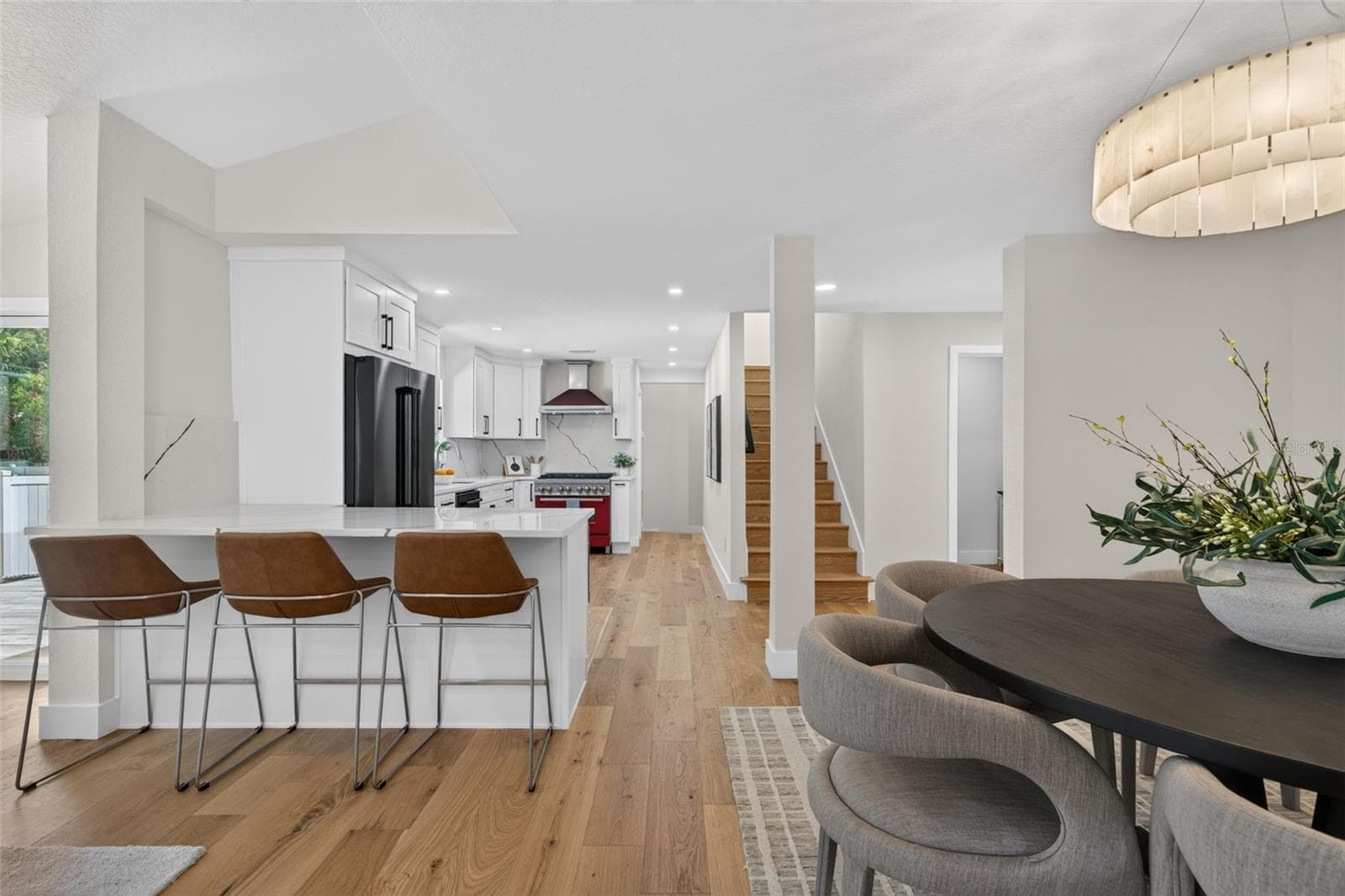 View of breakfast bar and view of the kitchen - 310 PARK ST N, ST PETERSBURG