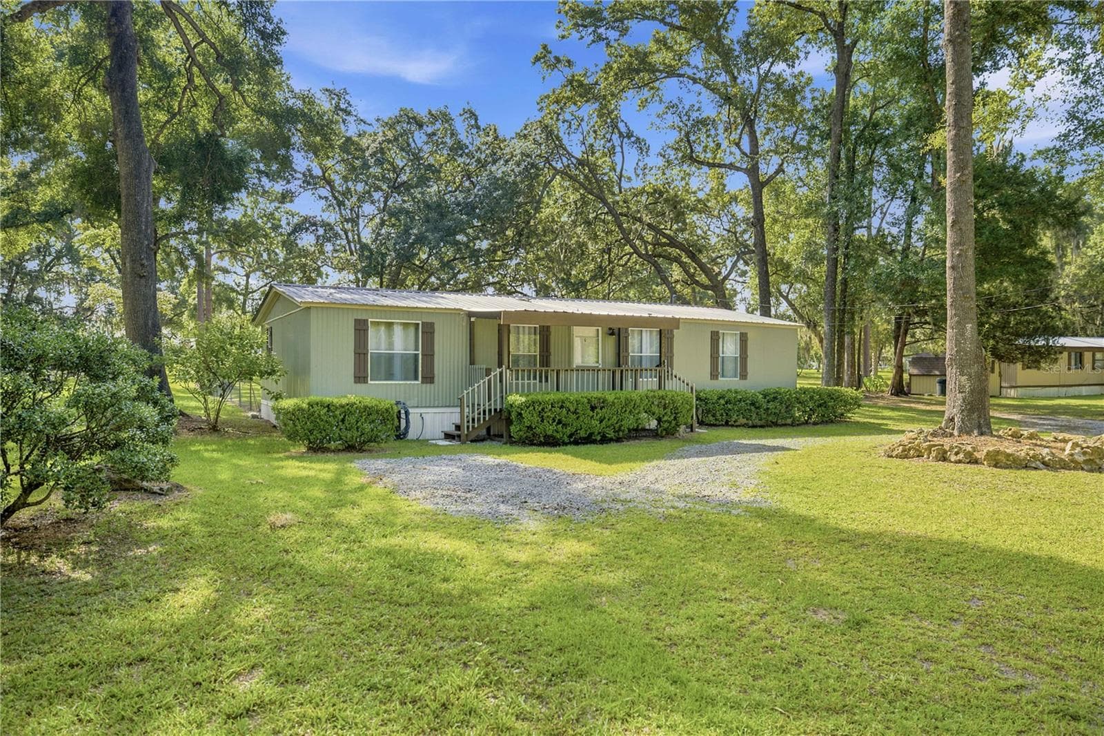 Manufactured Home at 6675 NW 49TH CT, OCALA, photo 2 of 43
