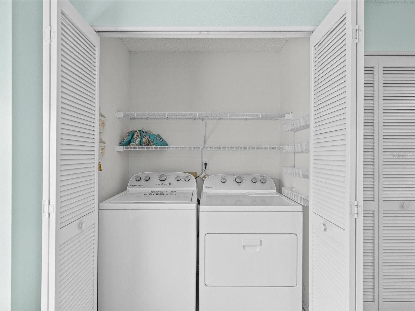 Indoor laundry closet - 830 MCCALLISTER AVE, SUN CITY CENTER
