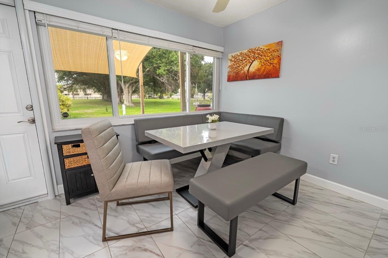 LARGE BREAKFAST KITCHEN NOOK, WITH CLEAR VIEW OF POND & FOUNTAIN - 8235 BURGUNDY DR N #3, PINELLAS PARK