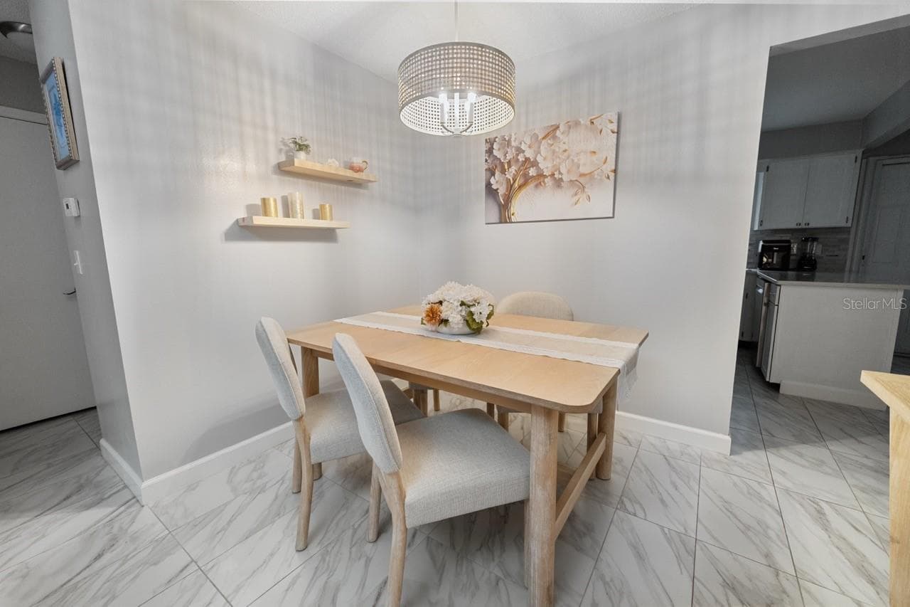 DINING ROOM, LOOK AT THIS LIGHTING - 8235 BURGUNDY DR N #3, PINELLAS PARK