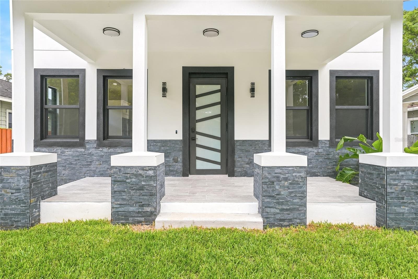 Front Exterior - 7106 N 10TH ST, TAMPA