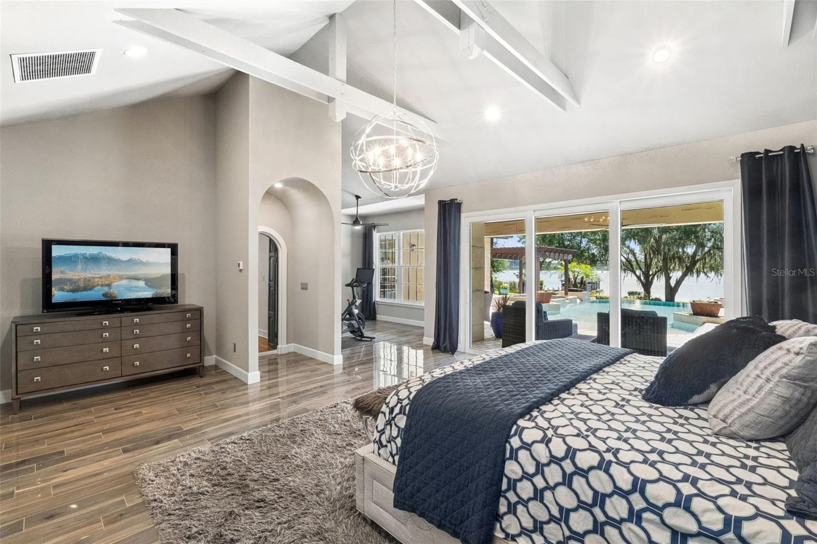 Spacious Primary Bdroom with Flex room, vaulted ceilings with beams and of course a view of the Lake and the Pool!!!! - 1629 HEMPEL AVE, WINDERMERE