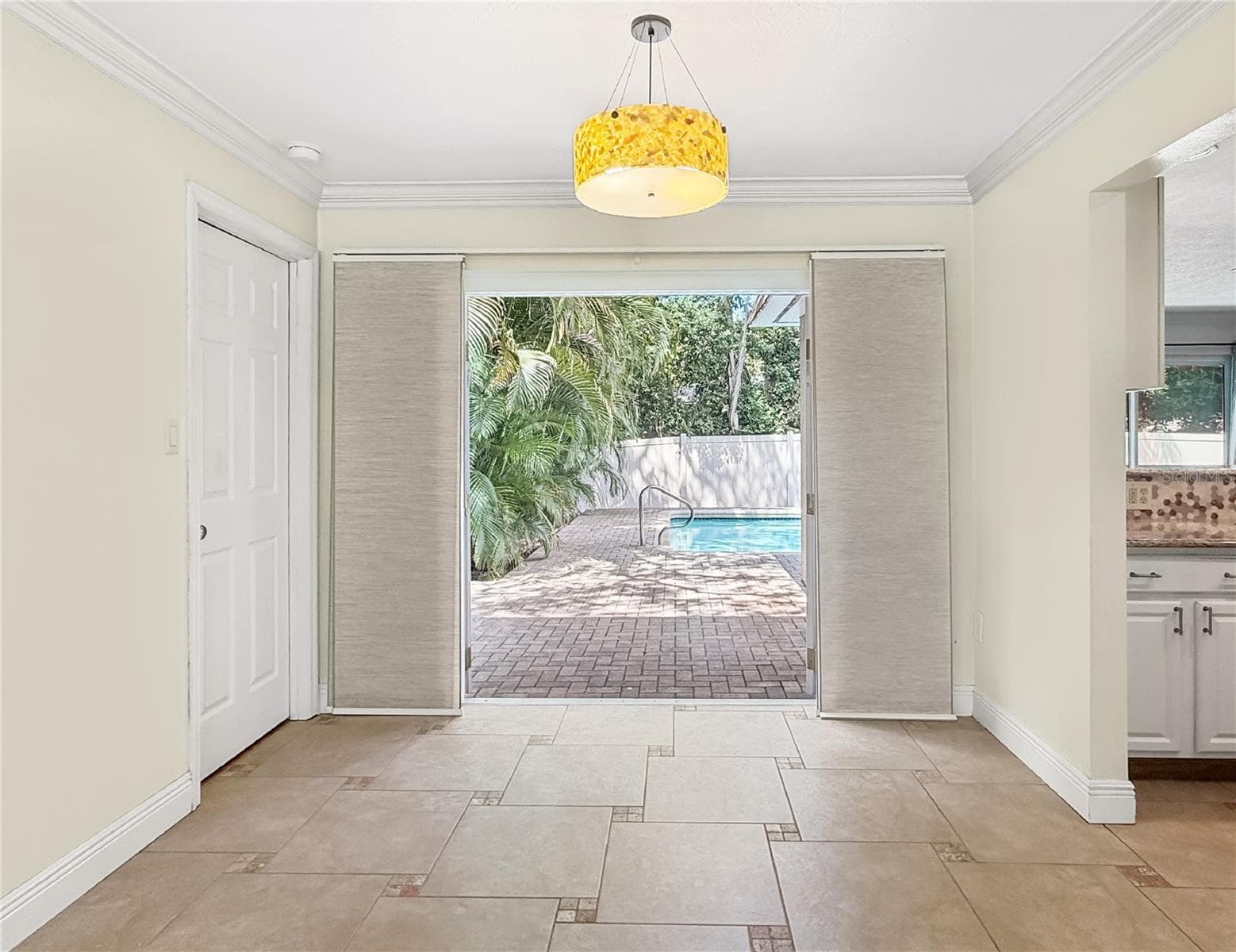 Dining Room Looking to Patio - 1011 WINDING OAKS DR, PALM HARBOR