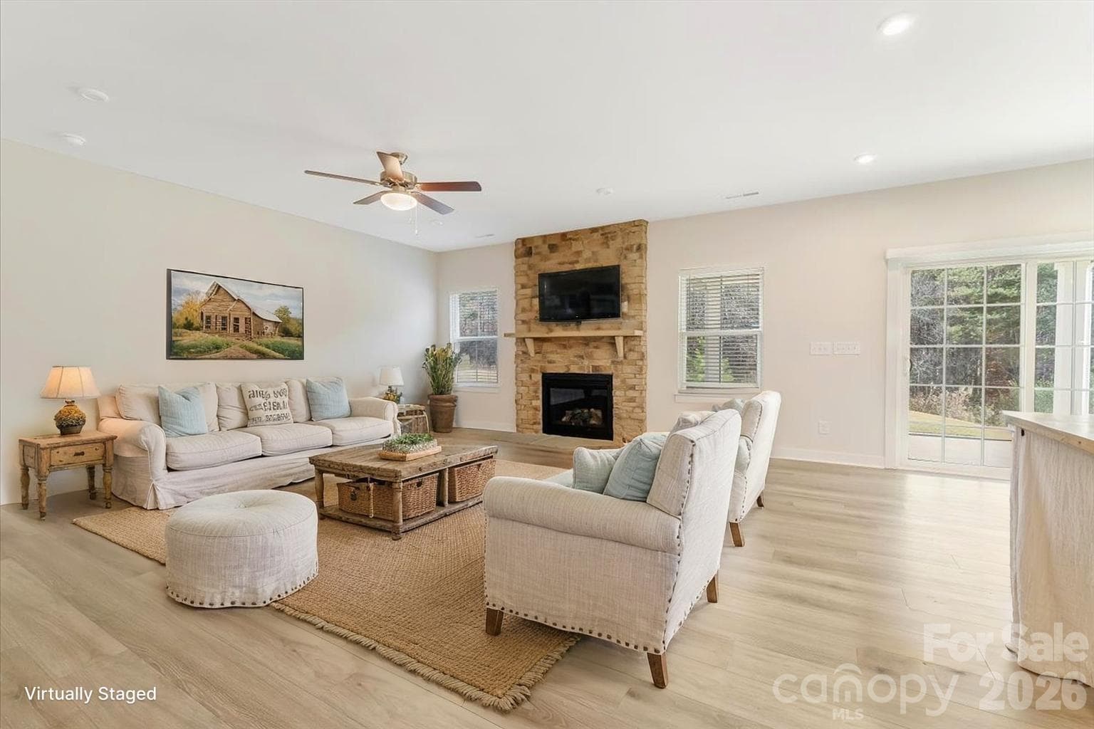Living room with gas logs open concept living at its best. Virtually staged - Mooresville