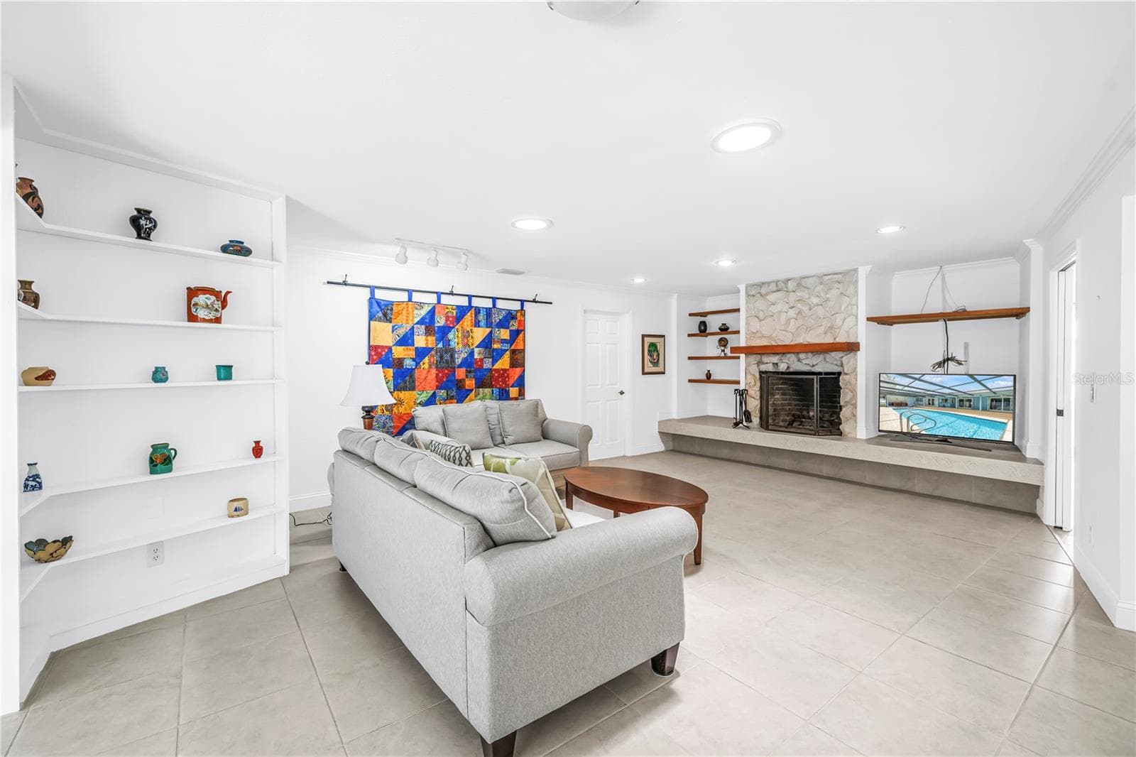 Cozy wood burning fireplace in the family room - 3000 HERON PL, CLEARWATER