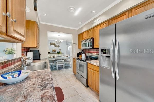 KITCHEN VIEW WITH STAINLESS - 133 STAFFORD CIR, PALM HARBOR