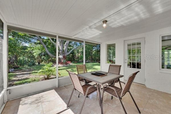 LANAI WITH CER FLOORING - 133 STAFFORD CIR, PALM HARBOR