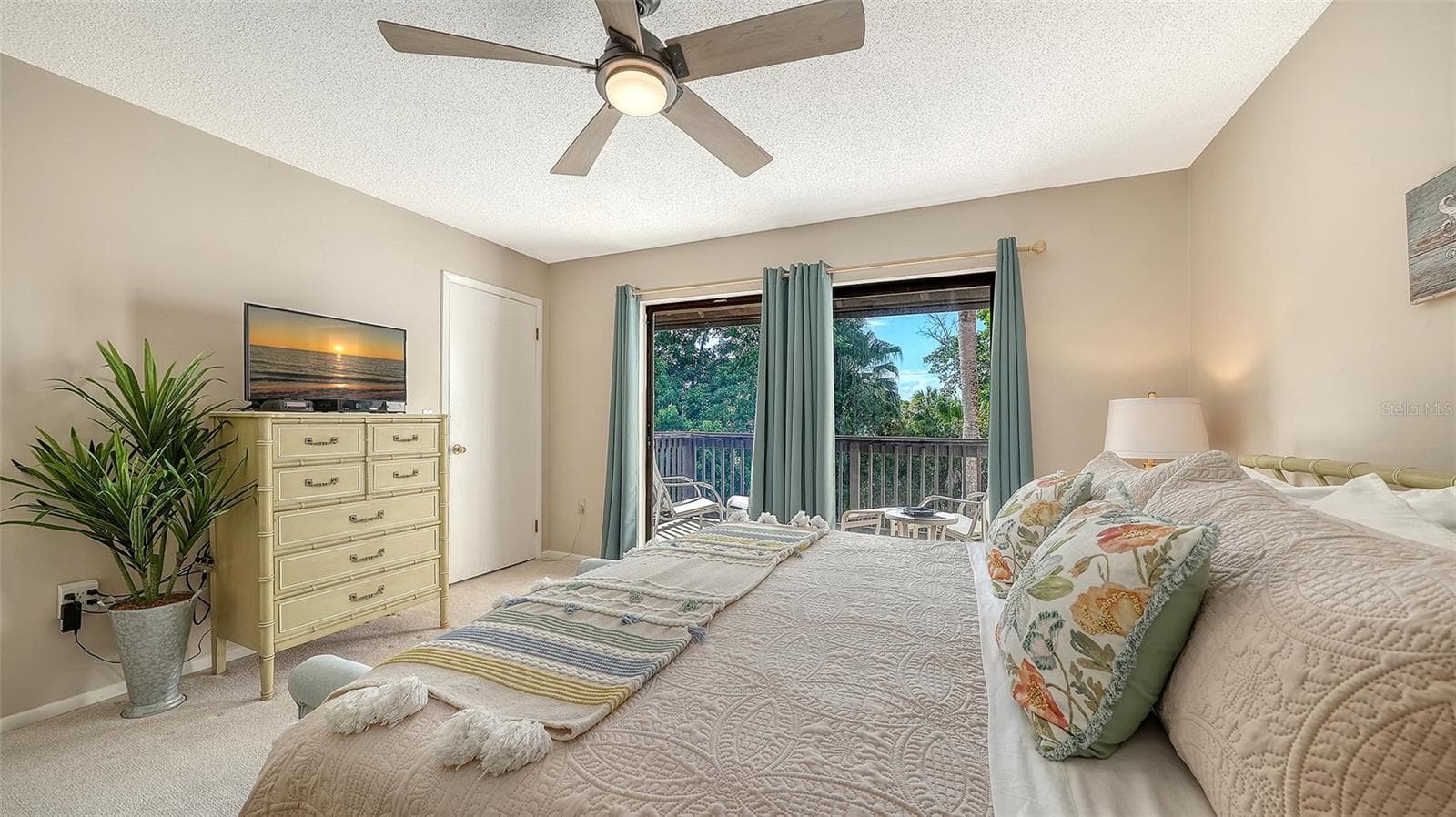 Primary Bedroom, second floor rear with open balcony. - 1646 STICKNEY POINT RD #101, SARASOTA