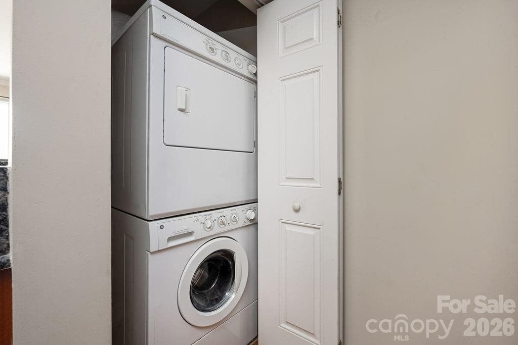 Stacked washer/dryer in kitchen - 300 W 5th Street, Charlotte