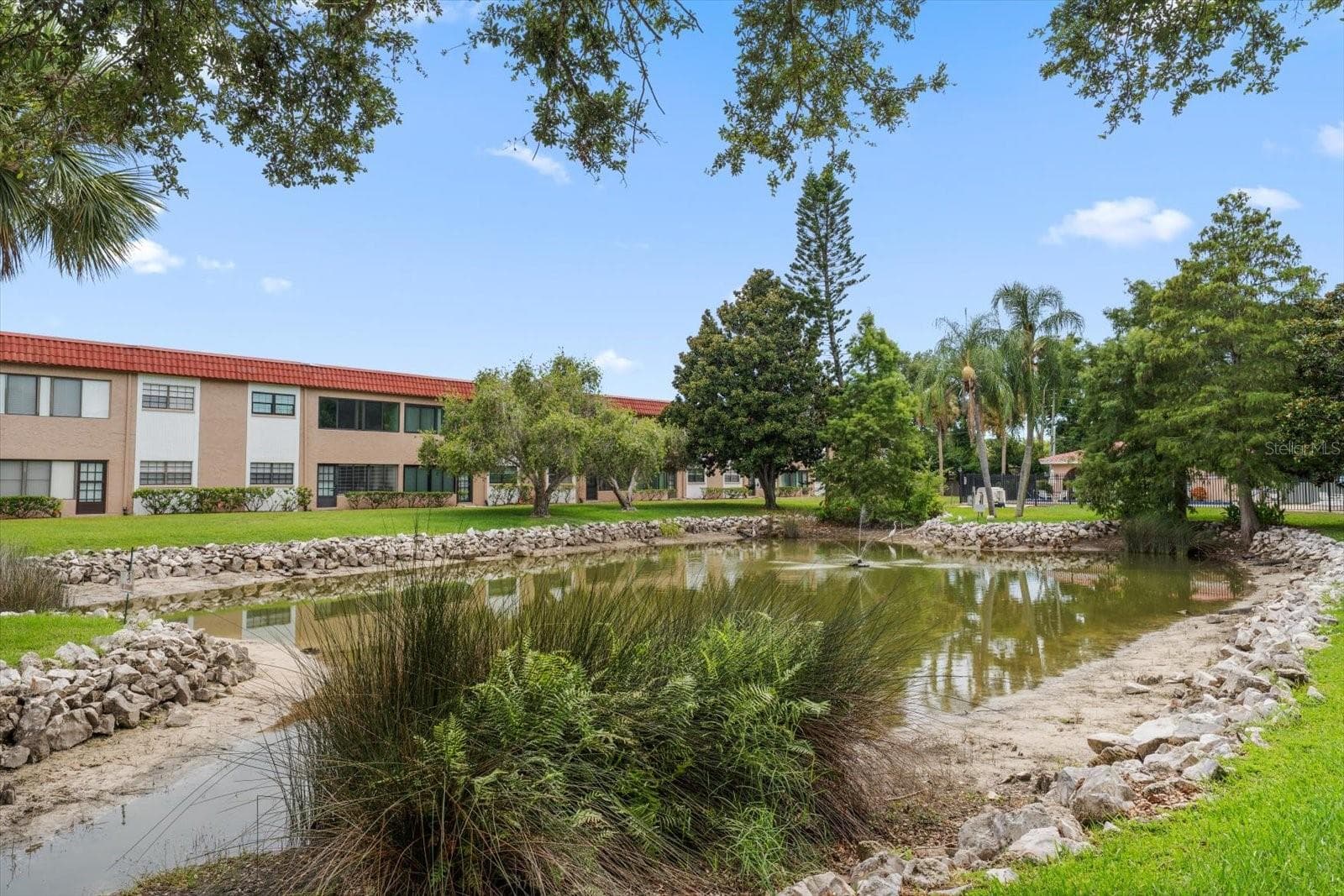 Condominium at 1750 BELLEAIR FOREST DR #B8, BELLEAIR, photo 35 of 43
