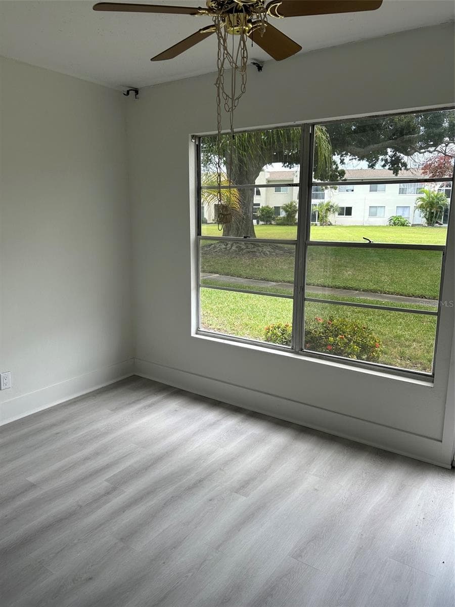 View from the Florida Room to rear of property. - 4520 OVERLOOK DR NE #132, ST PETERSBURG