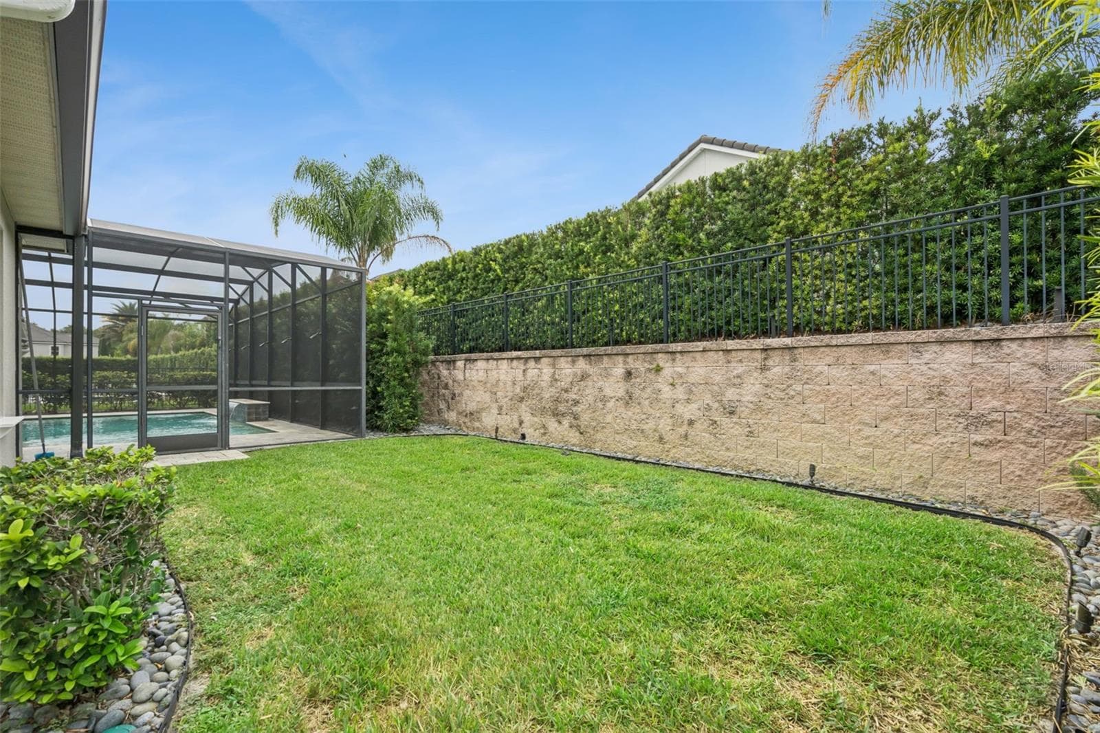 Backyard with lush landscaping - 1417 OIL LAMP CV, LAKE MARY